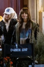 LILY COLLINS and CAMILLE RAZAT on the Set of Emily in Paris in Paris 02/16/2024