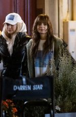 LILY COLLINS and CAMILLE RAZAT on the Set of Emily in Paris in Paris 02/16/2024