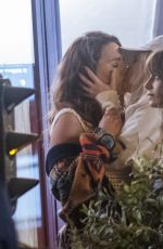LILY COLLINS and CAMILLE RAZAT on the Set of Emily in Paris in Paris 02/16/2024