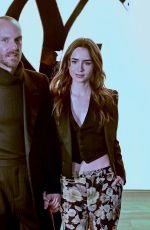 LILY COLLINS at Saint Laurent Womenswear Fall/Winter 2024-2025 Show at Paris Fashion Week 02/27/2024