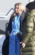 LOTTIE MOSS with Her Makeup Artist and Wardrobe Assistant in Bucharest 02/13/2024