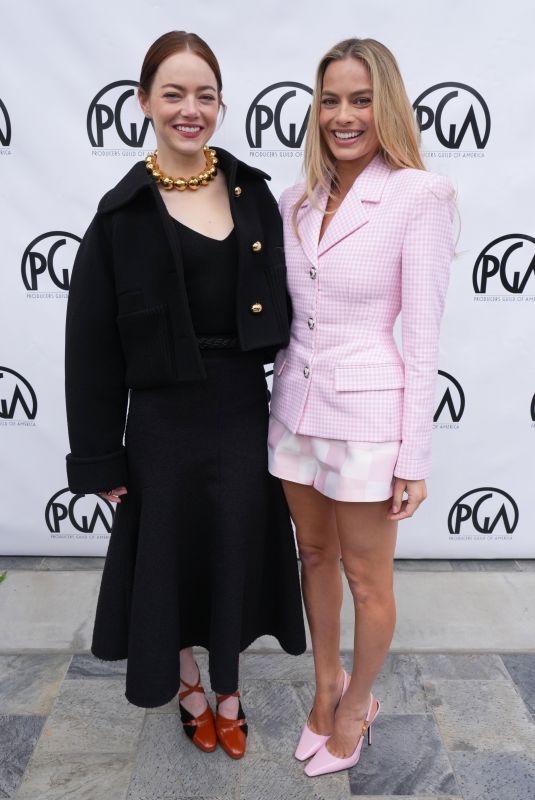 MARGOT ROBBIE and EMMA STONE at Producers Guild of America Awards Nominee Breakfast in Los Angeles 02/24/2024
