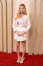 MARGOT ROBBIE at 96th Oscars Nominees Luncheon in Beverly Hills 02/12/2024