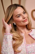 MARGOT ROBBIE at 96th Oscars Nominees Luncheon in Beverly Hills 02/12/2024