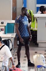 MAYA JAMA and Stormzy Smoking a Roll-up while Departing from South Africa 02/20/2024