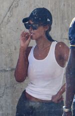 MAYA JAMA and Stormzy Smoking a Roll-up while Departing from South Africa 02/20/2024