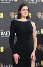 MEG BELLAMY at EE Bafta Film Awards 2024 in London 02/18/2024
