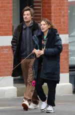 MILLIE BOBBY BROWN and Jake Bongiovi Out with Their Dog in New York 02/17/2024