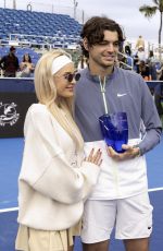 MORGAN RIDDLE Poses with Taylor Fritz After He Wins 2024 Delray Beach Open 02/19/2024