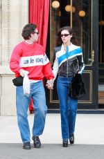 NICOLA PELTZ and Brooklyn Beckham Out in Paris 02/27/2024