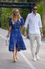 PARIS HILTON and Carter Reum Takes a Stroll on Miami Beach Boardwalk 02/01/2024