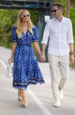 PARIS HILTON and Carter Reum Takes a Stroll on Miami Beach Boardwalk 02/01/2024