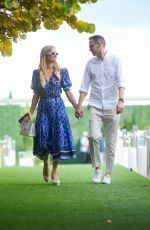 PARIS HILTON and Carter Reum Takes a Stroll on Miami Beach Boardwalk 02/01/2024