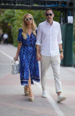 PARIS HILTON and Carter Reum Takes a Stroll on Miami Beach Boardwalk 02/01/2024