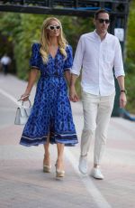 PARIS HILTON and Carter Reum Takes a Stroll on Miami Beach Boardwalk 02/01/2024