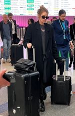 STELLA MAXWELL Arrives at Los Angeles International Airport 02/04/2024