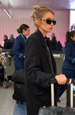 STELLA MAXWELL Arrives at Los Angeles International Airport 02/04/2024