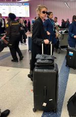 STELLA MAXWELL Arrives at Los Angeles International Airport 02/04/2024