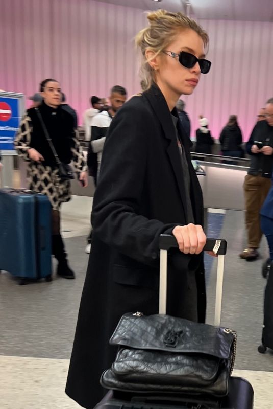 STELLA MAXWELL Arrives at Los Angeles International Airport 02/04/2024