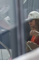 TAYLOR SWIFT Boarding a Private Jet to Leave Melbourne 02/18/2024