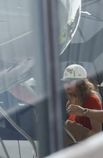 TAYLOR SWIFT Boarding a Private Jet to Leave Melbourne 02/18/2024