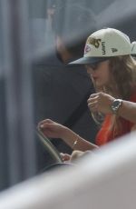 TAYLOR SWIFT Boarding a Private Jet to Leave Melbourne 02/18/2024