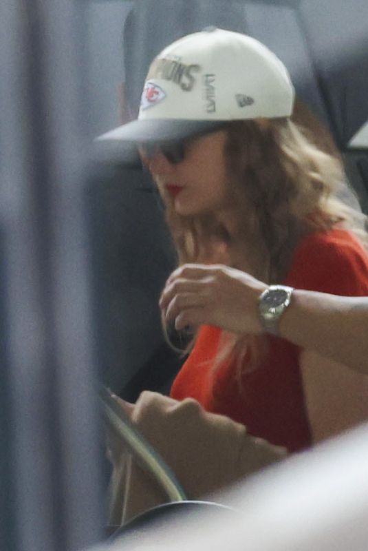 TAYLOR SWIFT Boarding a Private Jet to Leave Melbourne 02/18/2024