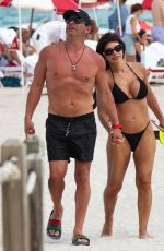 TERESA GIUDICE in Bikini and Luis Ruelas at a Beach in Miami 02/18/2024