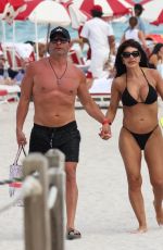 TERESA GIUDICE in Bikini and Luis Ruelas at a Beach in Miami 02/18/2024