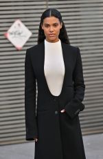 TINA KUNAKEY Arrives at Courreges Fashion Show at Paris Fashion Week 02/28/2024