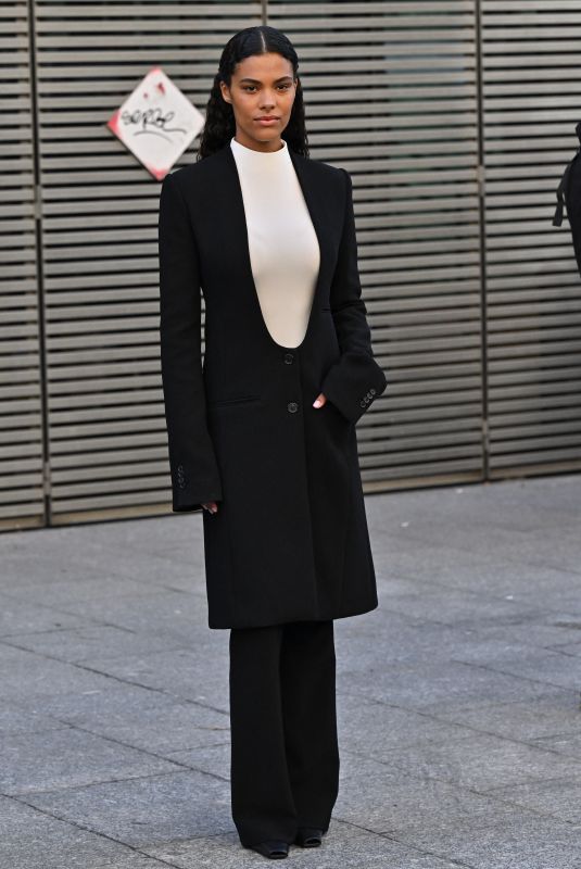 TINA KUNAKEY Arrives at Courreges Fashion Show at Paris Fashion Week 02/28/2024
