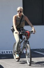ZOE GREGORY Out Riding a Bike in Fort Lauderdale 02/21/2024