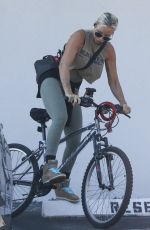 ZOE GREGORY Out Riding a Bike in Fort Lauderdale 02/21/2024