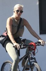 ZOE GREGORY Out Riding a Bike in Fort Lauderdale 02/21/2024