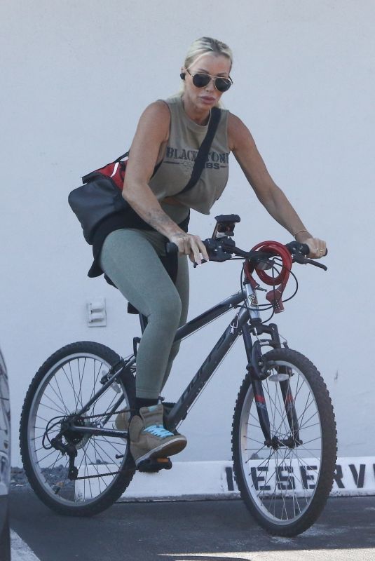 ZOE GREGORY Out Riding a Bike in Fort Lauderdale 02/21/2024