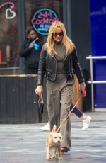 AMANDA HOLDEN Out with Her Dog in London 03/01/2024
