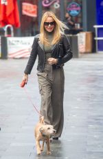 AMANDA HOLDEN Out with Her Dog in London 03/01/2024
