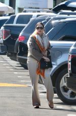 ASHLEY BENSON and Brandon Davis Out with Their Baby in Brentwood 03/04/2024
