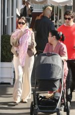 ASHLEY BENSON and Brandon Davis Out with Their Baby in Brentwood 03/04/2024