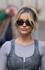 ASHLEY ROBERTS Arrives at Heart Radio in London 03/27/2024