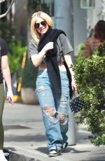 AVRIL LAVIGNE in Ripped Denim Out Shopping in Beverly Hills 03/15/2024