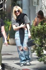 AVRIL LAVIGNE in Ripped Denim Out Shopping in Beverly Hills 03/15/2024
