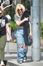 AVRIL LAVIGNE in Ripped Denim Out Shopping in Beverly Hills 03/15/2024