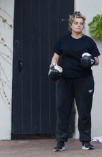 BEBE REXHA Shows off Her Boxing Skills with a Trainer in Los Angeles 03/16/2024