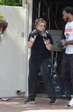 BEBE REXHA Shows off Her Boxing Skills with a Trainer in Los Angeles 03/16/2024