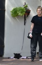 BEBE REXHA Shows off Her Boxing Skills with a Trainer in Los Angeles 03/16/2024