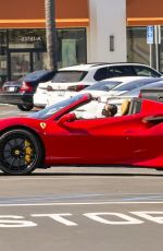 BLAC CHYNA Out  Drives in Her Convertible Red Ferrari in Calabasas 03/04/2024