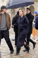 BRIE LARSON Arrives at Loewe Fashion Show at Paris Fashion Week 03/01/2024