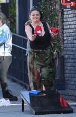 BRITTANY CATWRIGHT Playing Cornhole at Jax