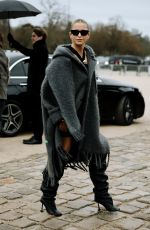 CAROLINE DAUR Arrives at Loewe Fashion Show at Paris Fashion Week 03/01/2024